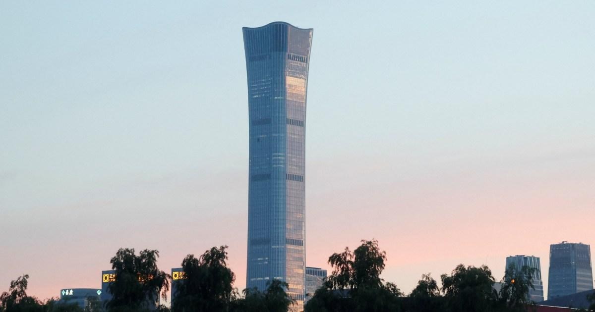 Plane crashes into Beijing’s tallest skyscraper the China Zun with wreckage plummeting to the ground