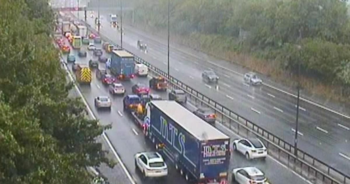 Hundreds of parcels destroyed after lorry goes up in flames and closes stretch of M25