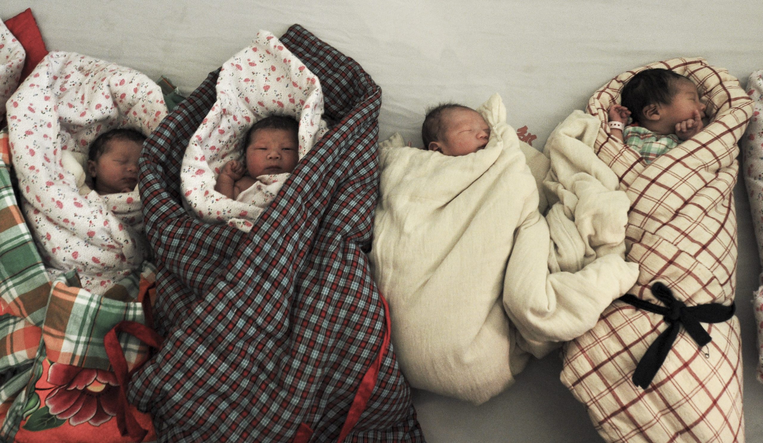 China suspends officials in forced abortion case