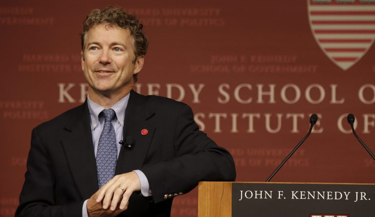 Sen. Rand Paul, R-Ky. smiles as he listens to a question during his public address at the John F. Kennedy Jr. Forum Institute of Politics at the Harvard Kennedy School, Friday April 25, 2014, in Cambridge, Mass. Fighting to move beyond his father's shadow, Paul is crafting new alliances with the Republican Party establishment during a Northeast tour that began Friday in Boston.  The 51-year-old Kentucky Republican, son of libertarian hero and former Texas Rep. Ron Paul, headlined an afternoon luncheon hosted by top lieutenants of former presidential nominee Mitt Romney _ a private meeting that comes as Paul weighs a 2016 presidential bid of his own.