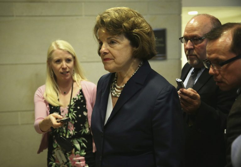 Sen. Dianne Feinstein, D-Calif., is followed by reporters as she arrives at a closed door briefing June 4, 2014 on Capitol Hill in Washington. (Photo by Alex Wong/Getty Images)