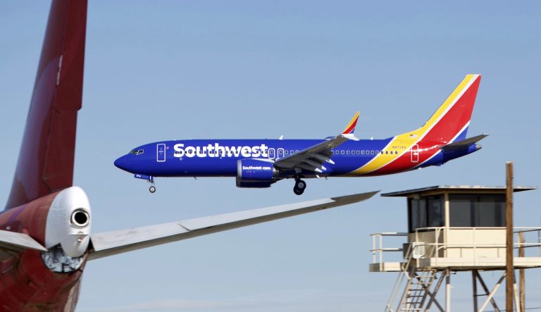 In this Saturday, March 23, 2019 photo, a Southwest Airlines Boeing 737 Max aircraft lands at the Southern California Logistics Airport in the high desert town of Victorville, Calif. 