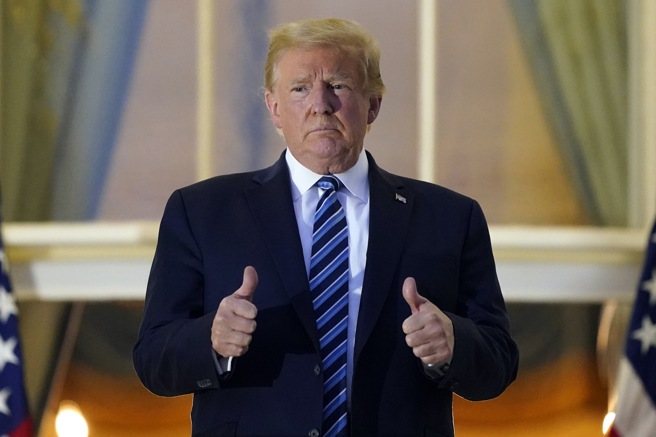 Trump, trailing in polls, bets on his base