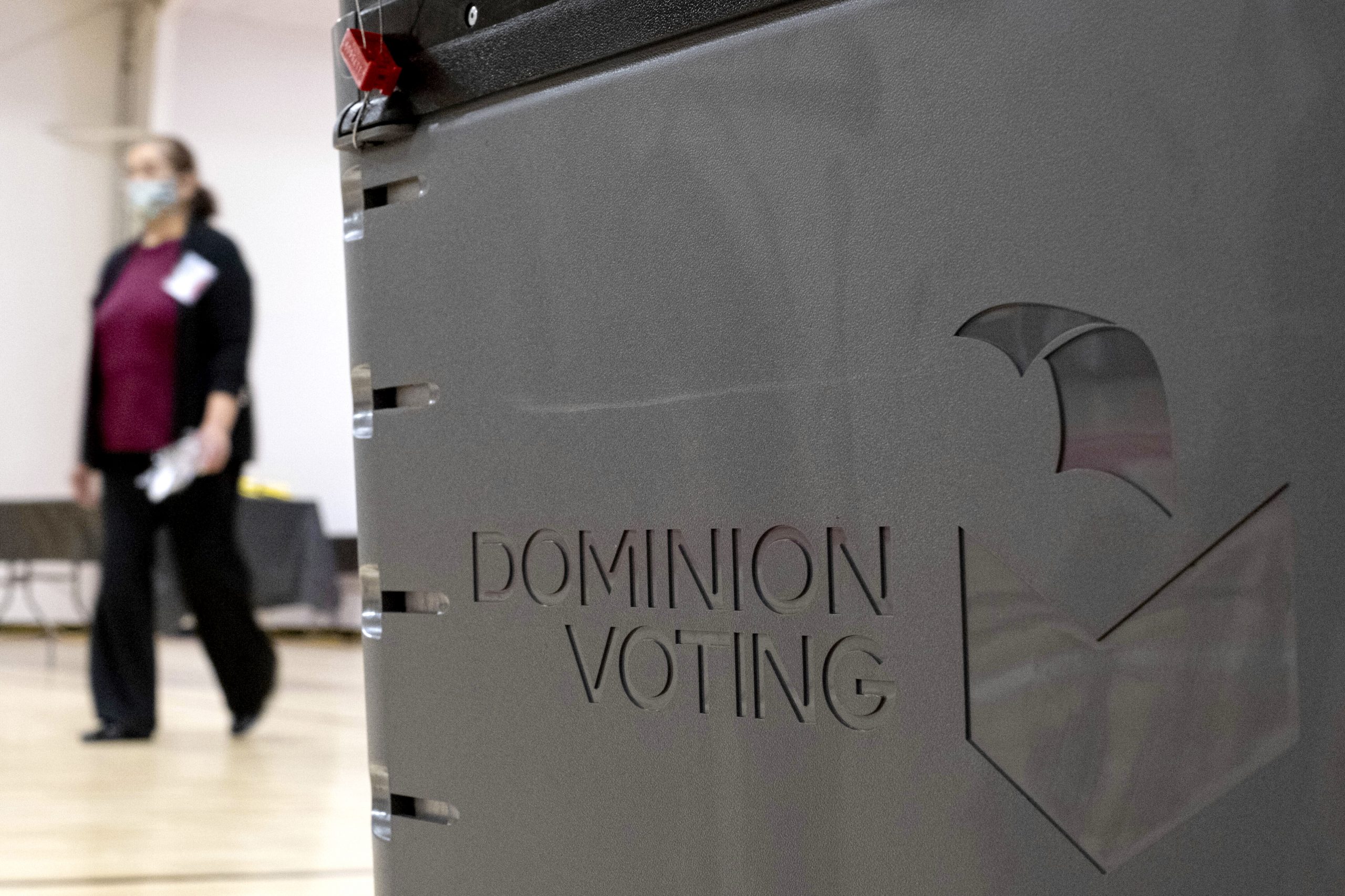Election security at center of voting software debate following recommendations to update