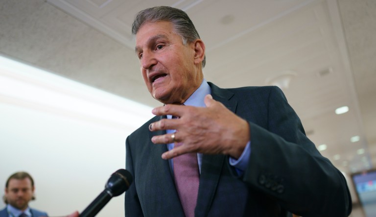 COVID looms over timing for Senate vote on Manchin-backed spending deal