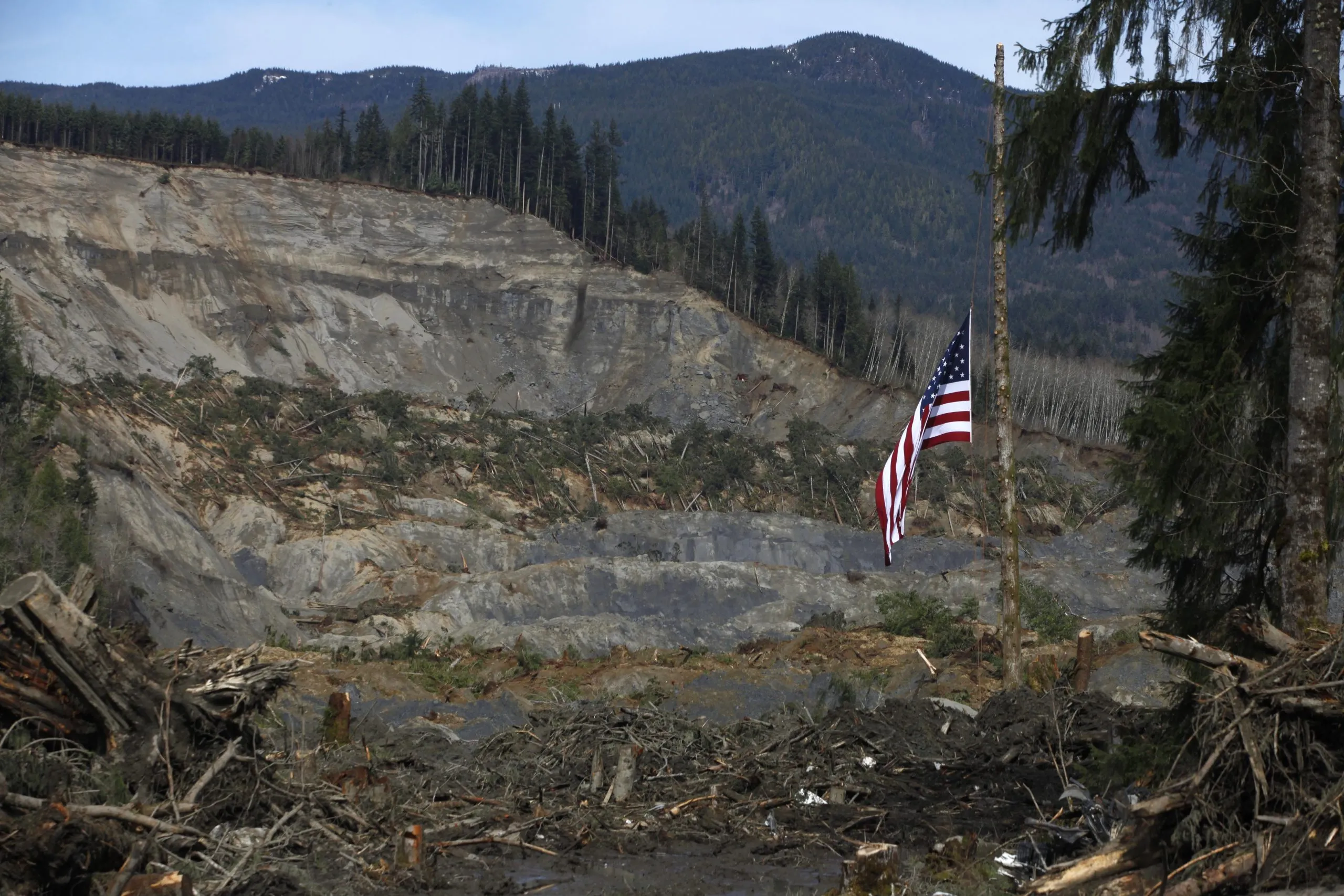 More mudslide victims found as state seeks new aid