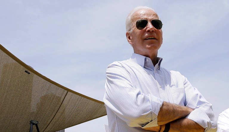Former vice president and Democratic presidential candidate Joe Biden speaks on Wednesday, June 5, 2019, beside Boston Mayor Marty Walsh, right, and renderings of a park in being constructed in Boston in honor of Martin Richard, the youngest victim of the 2013 Boston Marathon bombings.