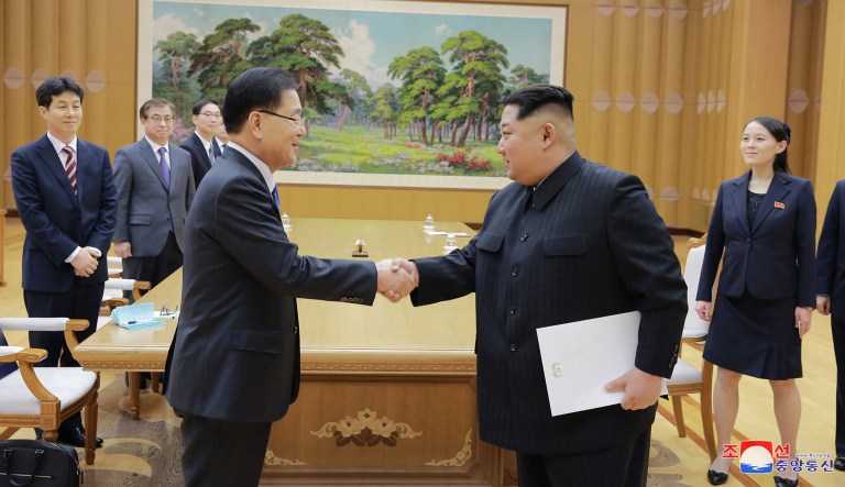North Korean leader Kim Jong Un shakes hands with South Korean National Security Director Chung Eui-yong after Chung gave Kim the letter from South Korean President Moon Jae-in, in Pyongyang, North Korea. (Korean Central News Agency/Korea News Service via AP)