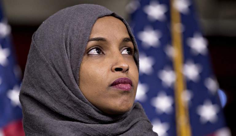 Representative-elect Ilhan Omar, a Democrat from Minnesota, listens during a news conference on Capitol Hill in Washington, D.C., U.S., on Friday, Nov, 30, 2018.