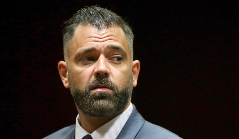 In this May 28, 2019 file photo, Mark D'Amico stands before pleading not guilty during his arraignment to charges including theft by deception at Burlington County Superior Court in Mount Holly, N.J. 
D'Amico is facing federal charges of conspiracy to commit wire fraud and money laundering. (Tim Tai/The Philadelphia Inquirer via AP, Pool, File)