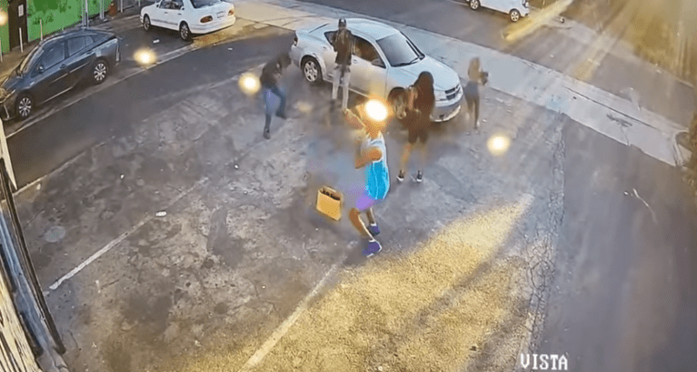 Armed shopper shoots would-be robbers and fends off assailants in dramatic scene