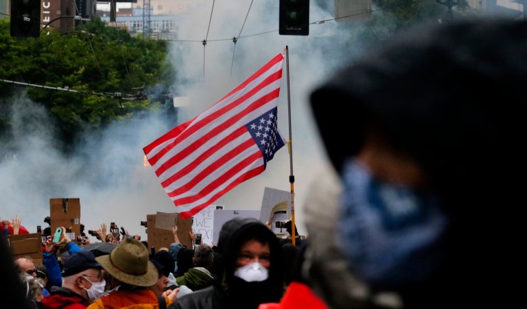 Smoke from a flash-bang rises on Pine Street east of Westlake Park.

Peaceful protest at Westlake Park and more violent group nearby.

Protests on Saturday May 30, 2020 214101 