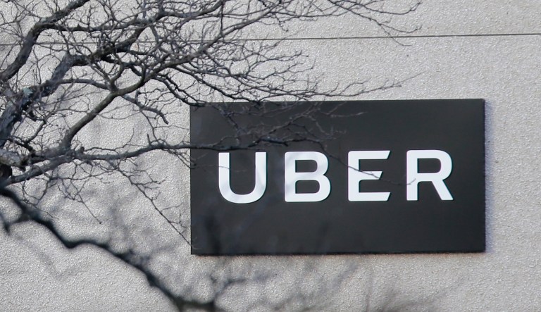 The logo for Uber appears above a trading post on the floor of the New York Stock Exchange, Thursday, May 30, 2019.         