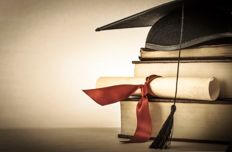 A recent study estimated that getting a college degree is worth about a half-million dollars over the course of a graduate's lifetime. (Thinkstock)