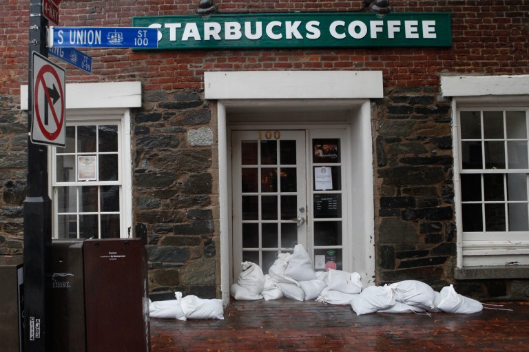 Sandbags line the entrance to a Starbucks coffee shop in Alexandria (Graeme Jennings/Examiner)