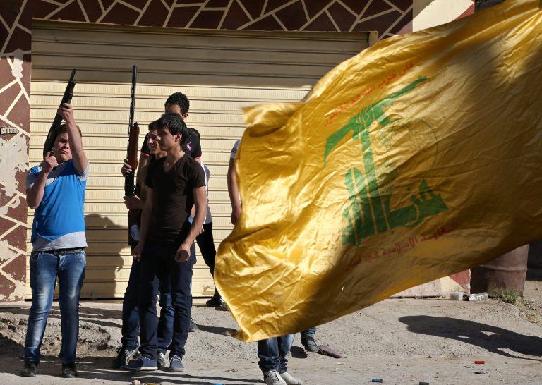 Hezbollah supporters fire weapons as they celebrate the fall of the Syrian town of Qusair to forces loyal to President Bashar Assad and Hezbollah fighters, in Bazzalieh village, Lebanon, near the Lebanese-Syrian border, Wednesday, June 5, 2013. The Syrian army captured a strategic town near the Lebanese border on Wednesday after a grueling three-week battle, handing a heavy defeat to rebels and solidifying a shift in the country's civil war in favor of President Bashar Assad's regime.(AP Photo/Hussein Malla)