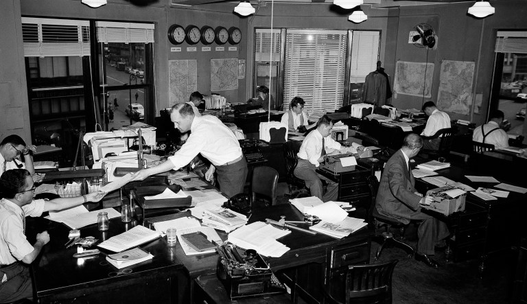 This is the central programming services division of Voice of America radio in New York, seen Feb. 27, 1953. These men and women write news, commentaries and dramatic programs for VOA.
