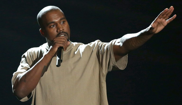 In this Sunday, Aug. 30, 2015, file photo, Kanye West accepts the video vanguard award at the MTV Video Music Awards at the Microsoft Theater in Los Angeles.