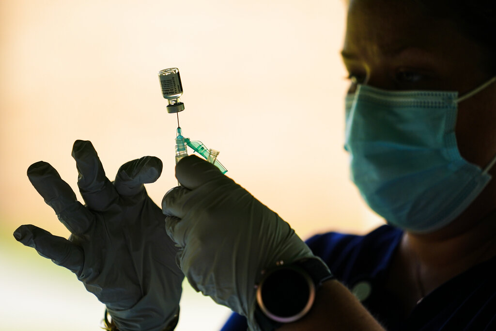FDA vaccine panel approves Pfizer booster shots for people over 65 after rejecting it for younger adults
