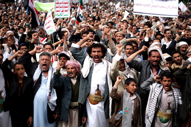 FILE - In this Thursday, Oct. 9, 2014 file photo, Houthi Shiite rebels chant slogans during a protest near the site of a suicide bombing in Sanaa, Yemen. Yemen's 2011 Arab Spring revolt began with a nucleus of young men and women, a mix of socialists, secularists and moderate Islamists seeking to end autocrat Ali Abdullah Saleh's 33-year rule and transform the poorest Arab nation into a democratic, modern society. In October 2014, nearly four years later, Yemen is in chaos and Shiite rebels have overrun the capital. Saleh is out of power, but remains powerful, with his loyalists infusing the political scene and the military. Attempts at real reform are in disarray. (AP Photo/Abdullrhman Huwais, File)