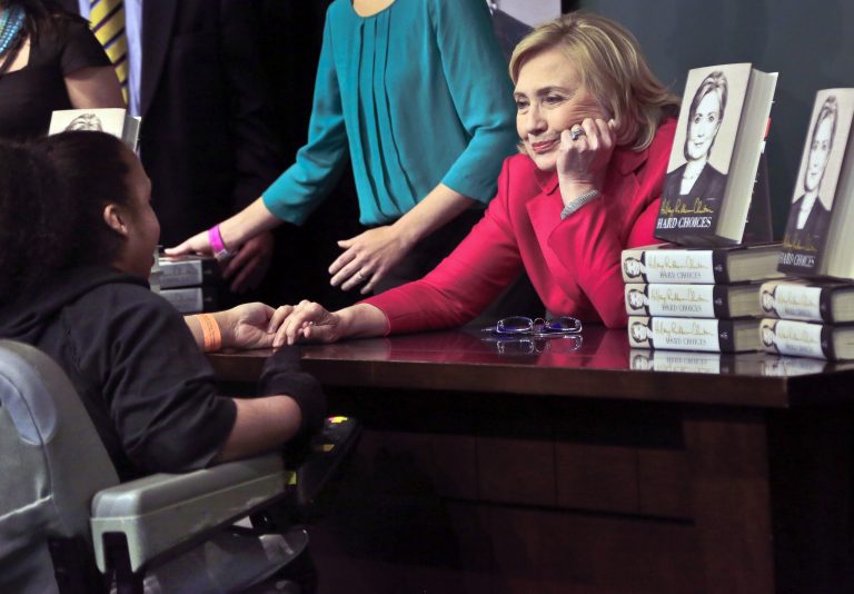 Hillary Clinton decided Tuesday to clarify her complaint that she and former President Bill Clinton were 
