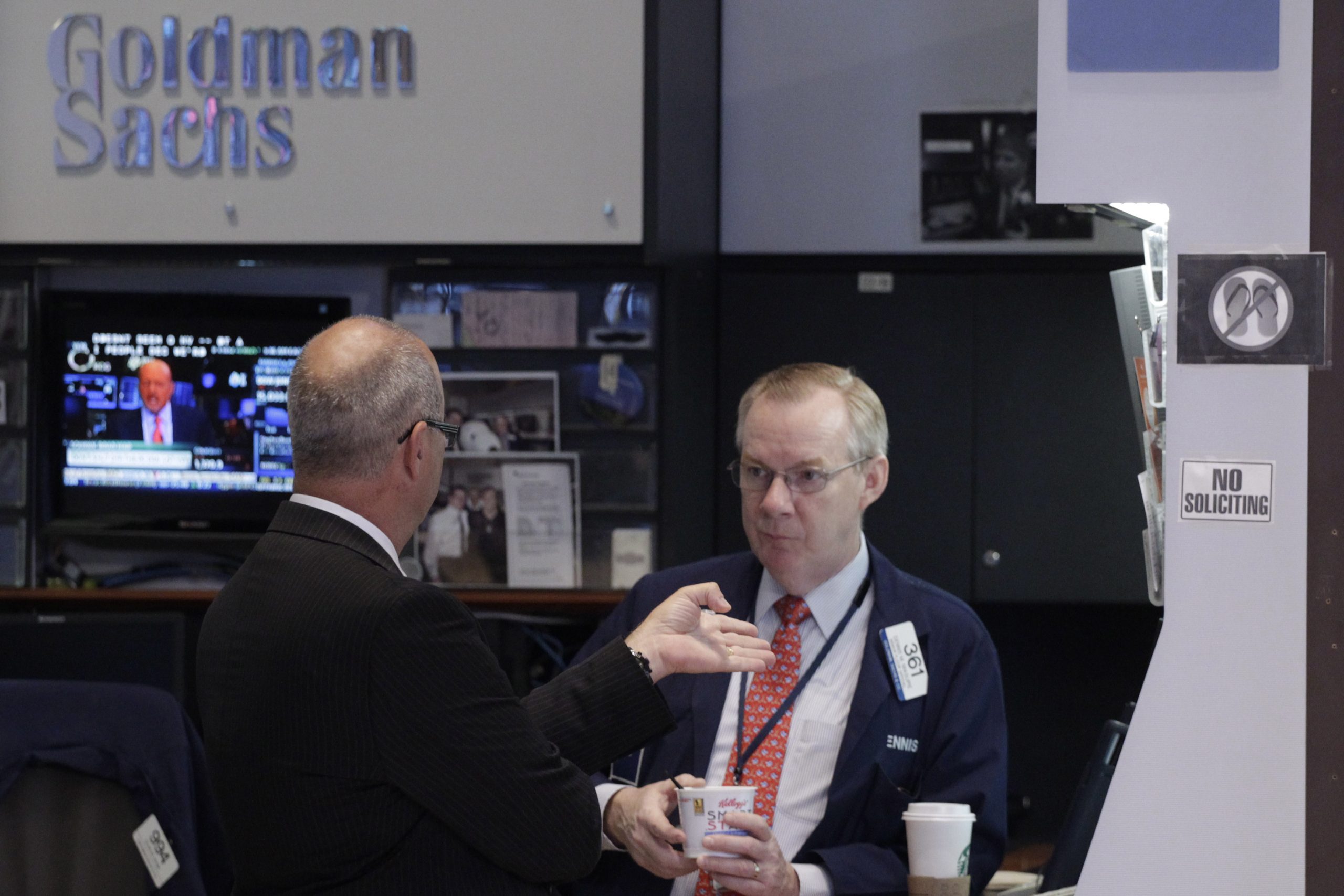 Goldman Sachs posts higher profit and revenue