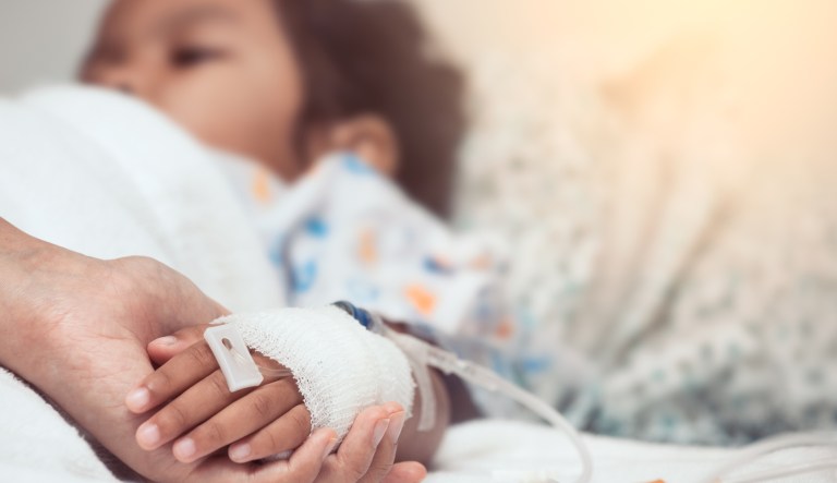 A sick child is pictured.