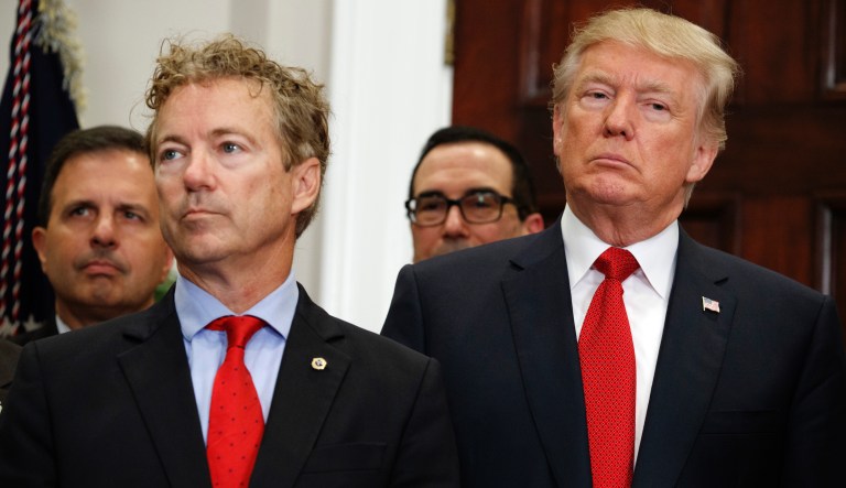 President Trump stands with Sen. Rand Paul, R-Ky., during an event to sign an executive order on health care in the Roosevelt Room of the White House, Thursday, Oct. 12, 2017, in Washington. 