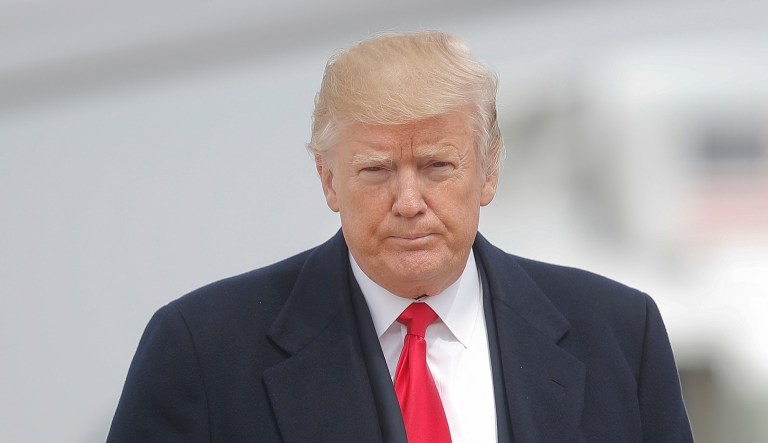 President Donald Trump walks across the tarmac before boarding Air Force One during his departure from Andrews Air Force Base, Md., Thursday, March 29, 2018. (AP Photo/Pablo Martinez Monsivais)