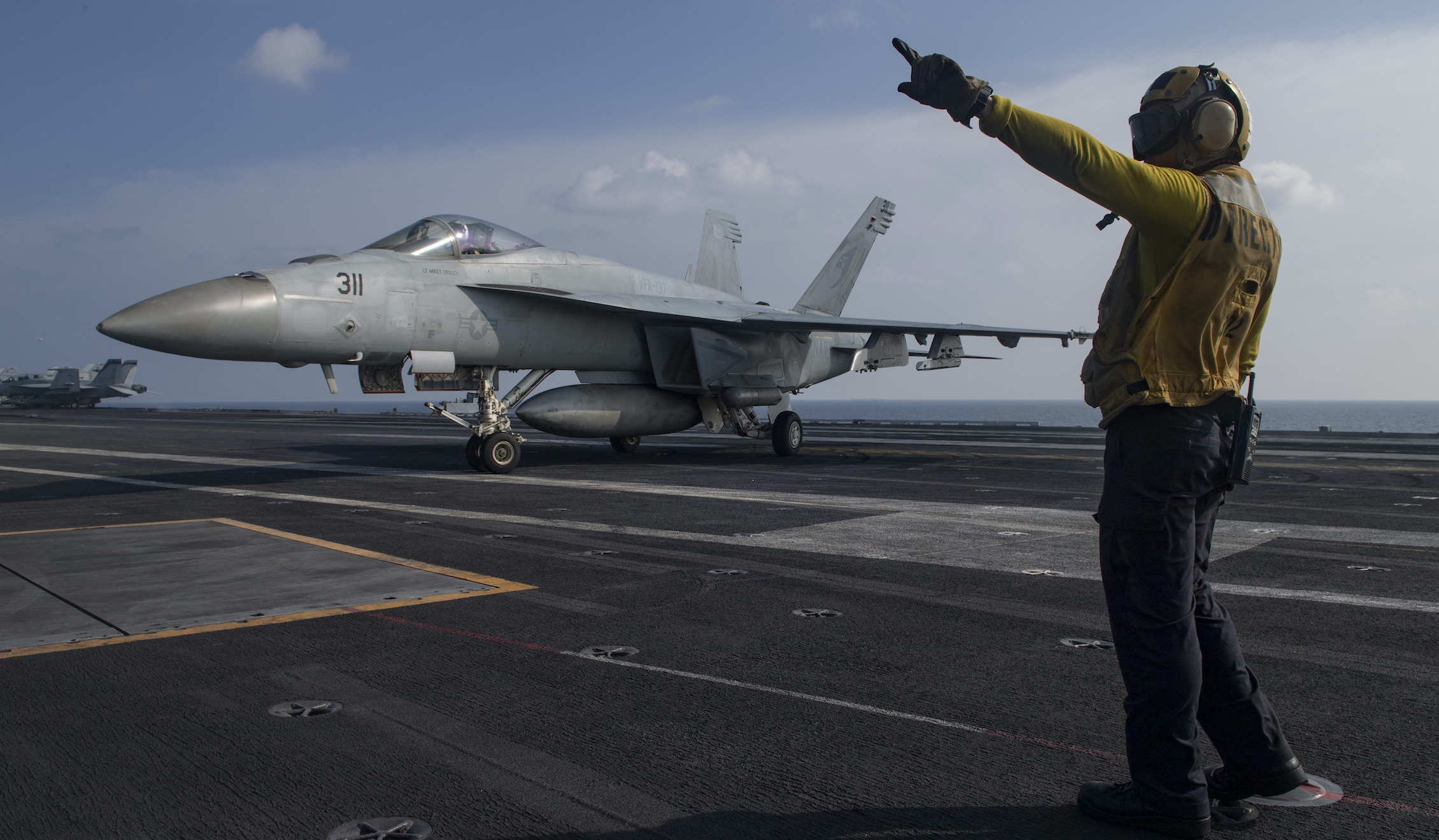 Defense secretary signals China will be major focus and plans visit to region