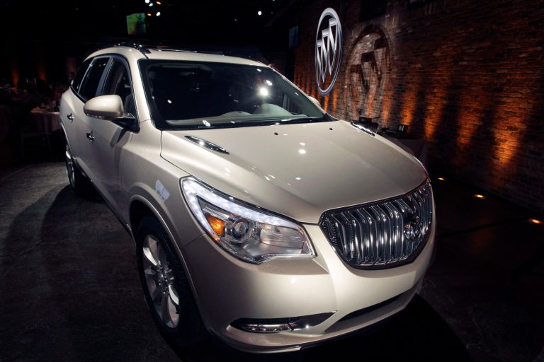 FILE - This April 3, 2012 file photo shows the 2013 Buick Enclave as it is unveiled at a news conference ahead of the New York International Car Show, in New York. General Motors on Tuesday, May 20, 2014 announced the recall of 2.4 million vehicles in the U.S., including the 2013 Enclave and other full-size crossovers from the 2009-2014 model years, as part of a broader effort to resolve outstanding safety issues more quickly. (AP Photo/Mary Altaffer, File)