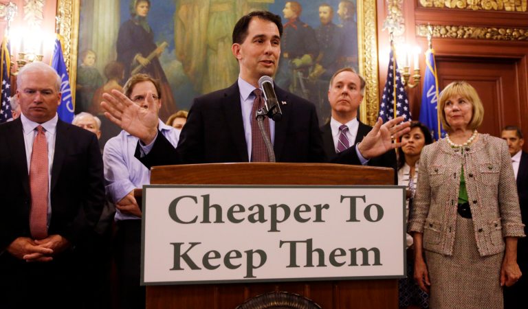 Wisconsin Gov. Scott Walker talks about a deal to pay for a new arena for the Milwaukee Bucks at a news conference in Madison, Wis. Taxpayers would pick up half the cost of a new $500 million arena for the NBA basketball team under a financial deal that would rely on current and former team owners for the rest, Walker said. (AP Photo/Morry Gash)