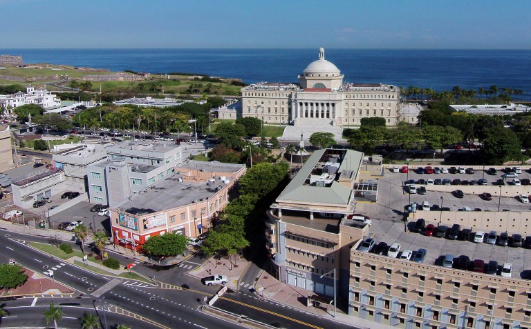 The first of the month marks the day Puerto Rico is expected to default on a $422 million debt-service payment that it lacks the funds to pay. (AP Photo/Ricardo Arduengo)