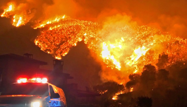 As fires rage across the West, Congress has disagreed over how to help fund wildfire response and impose forest management changes that could prevent fires from starting. (Mike Eliason/Santa Barbara County Fire Department via AP)