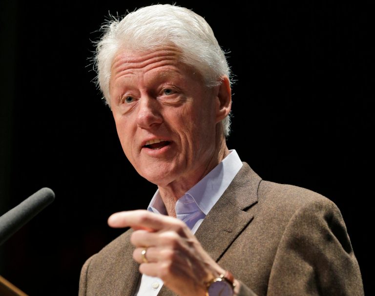 FILE - In this Oct. 30, 2013 file photo, former President Bill Clinton speaks in Charlottesville, Va. Clinton, popular in territory unfriendly to President Barack Obama, is reprising his role as a super-surrogate for Democrats battling to keep their Senate majority and win other races. In the long run, Clinton could pick up political chits for his wife, Hillary Rodham Clinton, should she run for president in 2016. (AP Photo/Steve Helber, File)
