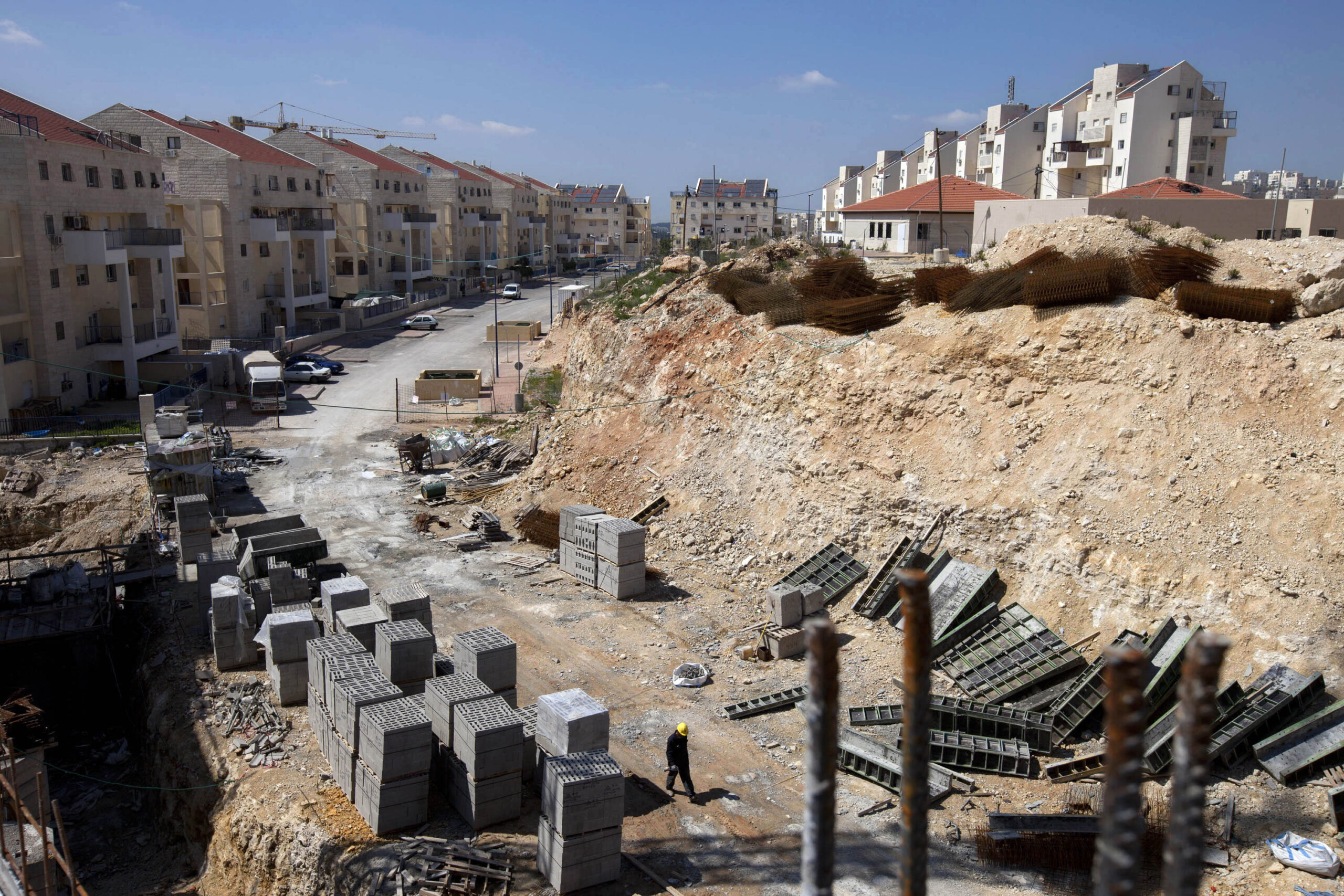 Group: Israel upped settlement work during talks