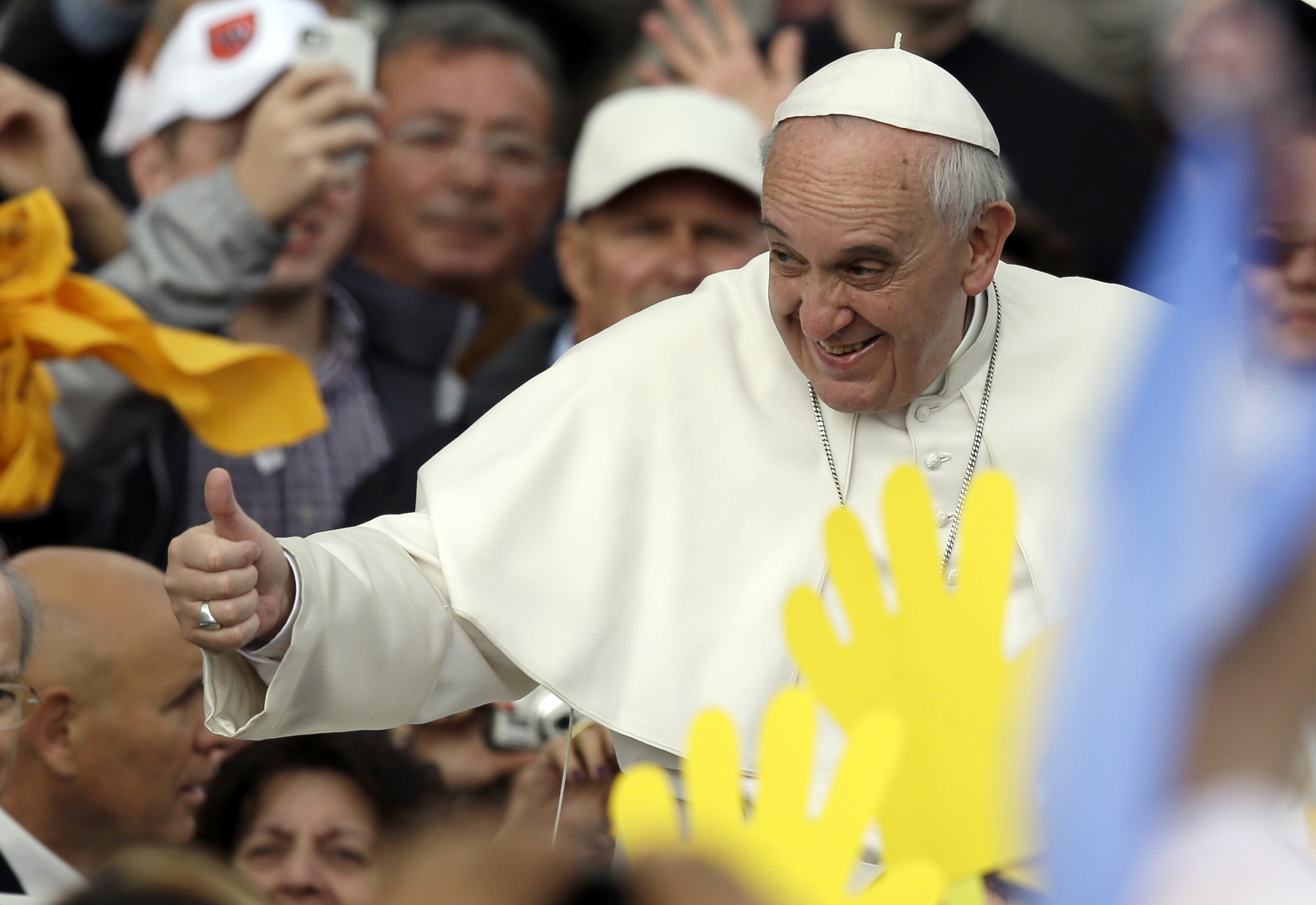 Pope blesses cross made from migrant boats
