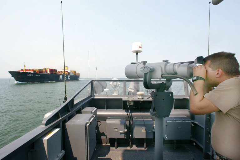 The Navy started escortingÂ U.S.-flagged commercial vessels through the Strait of HormuzÂ after the Marshall Islands-flagged Maersk Tigris container ship was intercepted by Iranian Revolutionary Guard Corps Navy vessels this week.Â Since then, the Tigris has been anchored and detained, in what Iran says is a financial dispute with the carrier. TheÂ Navy, has ships monitoring the Tigris from about 60 nautical miles away since the incident. (AP Photo)