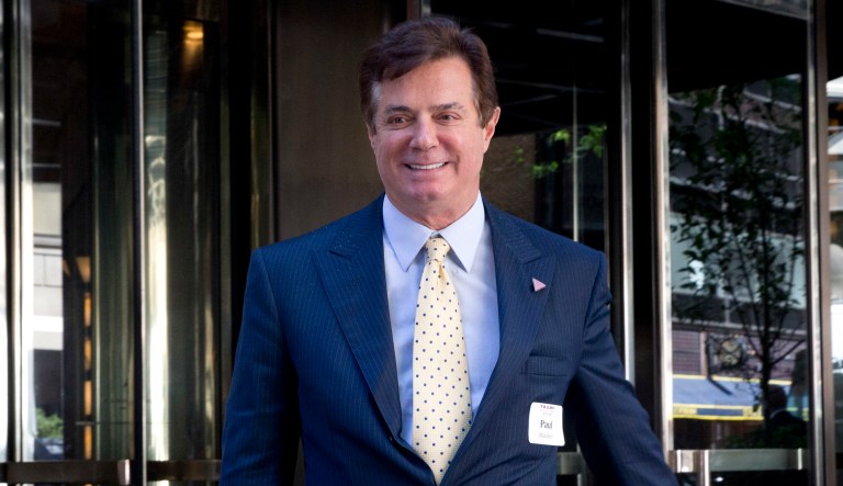The FBI raided Paul Manafort's Alexandria, Va., home last month after obtaining a search warrant for documents, according to a report published Wednesday morning. (AP Photo/Mary Altaffer, File)