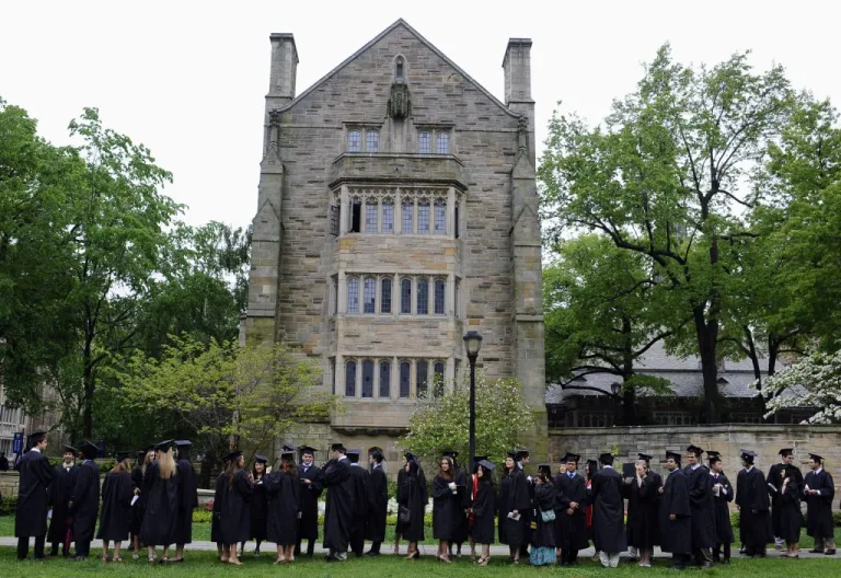 Future graduates line up for commencement on campus of Yale University