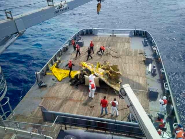 FILE - In this Monday, Nov. 25, 2013 file photo originally released by Venezuela's General Prosecutor Office, the wreckage of a small plane that crashed in January, which was carrying Vittorio Missoni and five other people, on the deck of a rescue boat near Los Roques, Venezuela. The CEO of the Italian fashion house that bears his name disappeared along with five other people in the waters off Venezuela in January 2013. A month later, two pieces of luggage from the plane washed up on a tiny island. His body has never been found. (AP Photo, File)