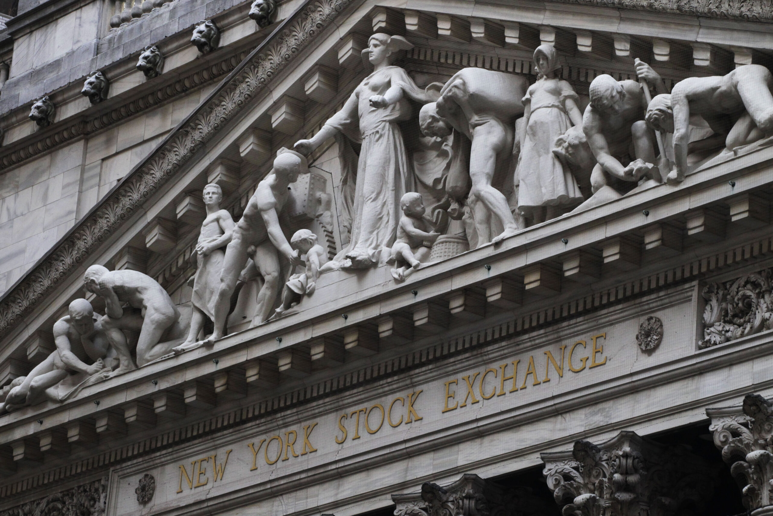 Stocks fall back from record levels
