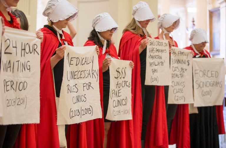 Why Are Women Dressing Up Like Offred From The Handmaid’s Tale?