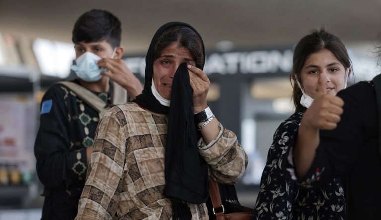 Afghan refugees arrive.