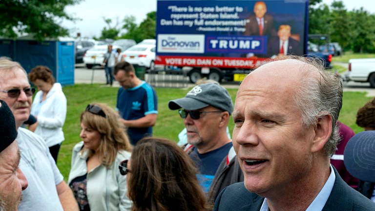 Incumbent Rep. Dan Donovan, R-N.Y., speaks to supporters and participants as he attends a property tax protest rally in the Staten Island borough of New York on June 23, 2018.