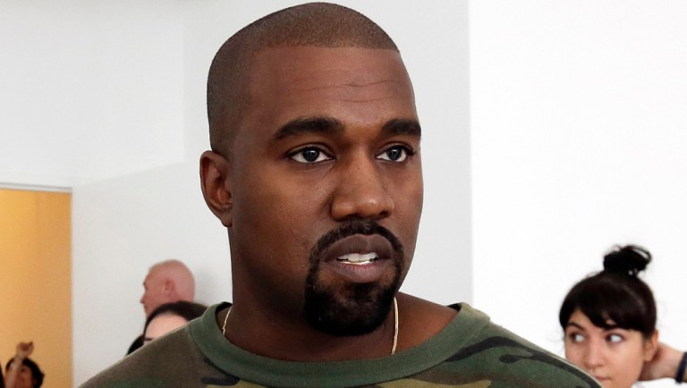 FILE - In this Sept. 10, 2015 file photo, Kanye West appears at the Brother Vellies Spring 2016 collection presentation during Fashion Week, in New York. West has unveiled a video that is all about a subject he knows something about: fame. The video for a single titled âFamousâ unveiled Friday, June 24, 2016, at a promotional event in the Los Angeles Forum _ features what appears to be a naked West with images of 11 other famous people, some of whom he has had good and bad relationships with, Vanity Fair magazine reported. The celebrities, who appear to be naked in a huge bed with West, are his wife, Kim Kardashian West; former President George W. Bush; presumptive Republican presidential nominee Donald Trump; Vogue editor Anna Wintour; singers Rihanna, Chris Brown and Taylor Swift; producer Ray J.; former girlfriend Amber Rose; transgender activist Caitlyn Jenner; and comedian Bill Cosby.