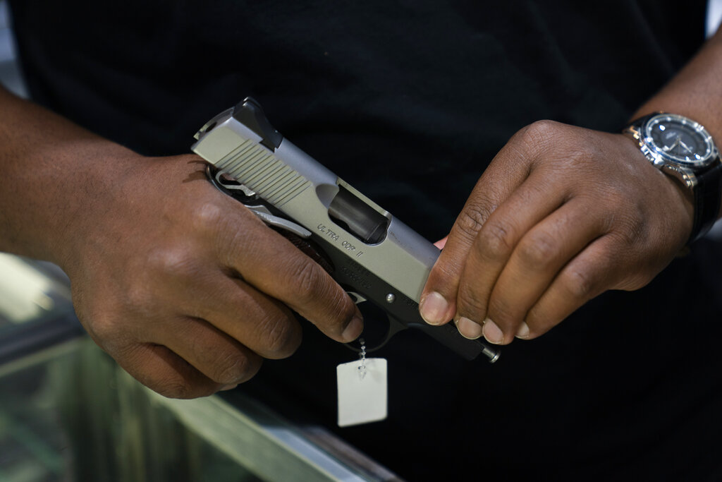 Gun control support sags as Biden repeats ban call