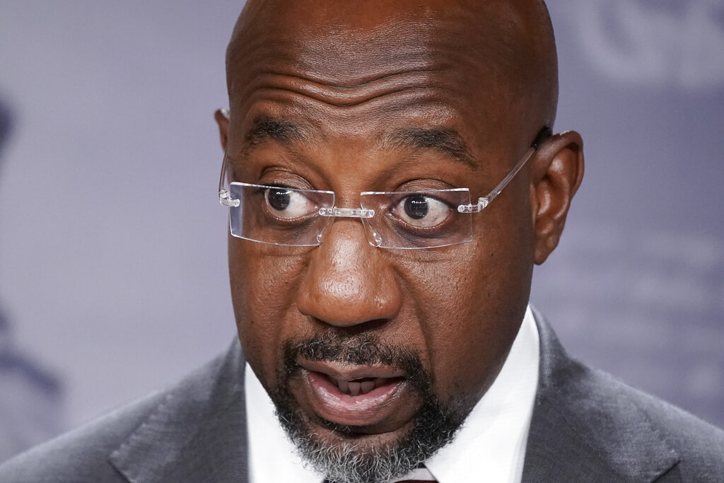 Warnock spending blitz eclipsed only by presidential campaigns: Analysis