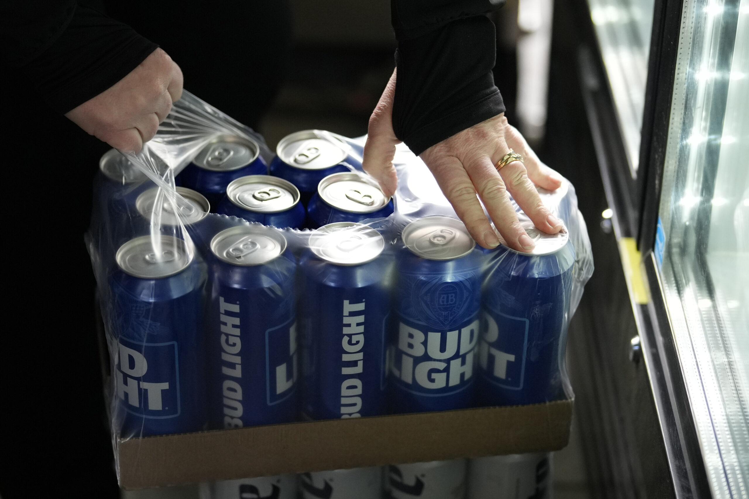 Anheuser-Busch hopes to win back angry customer base with free cases of Bud Light