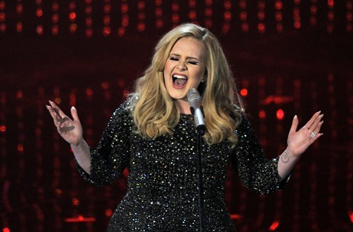 Singer Adele performs during the Oscars at the Dolby Theatre on Sunday Feb. 24, 2013, in Los Angeles.  (Photo by Chris Pizzello/Invision/AP)